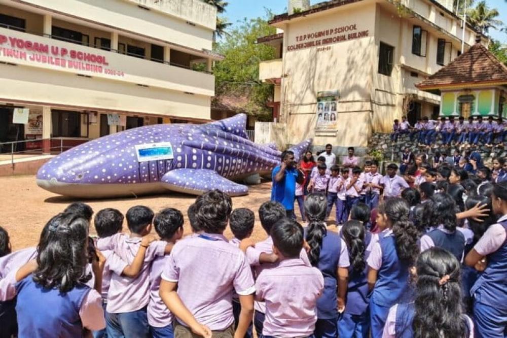 Ajit Shanghumukhom, a community volunteer and conservation advocate, speaks about marine life during an awareness campaign at a school in Thiruvananthapuram. Photo: Wildlife Trust of India.