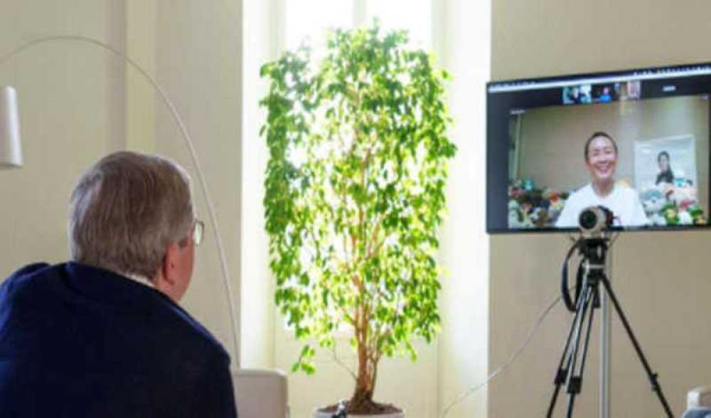 Chinese player Peng Shuai appears in video call , says she is fine to Olympic President