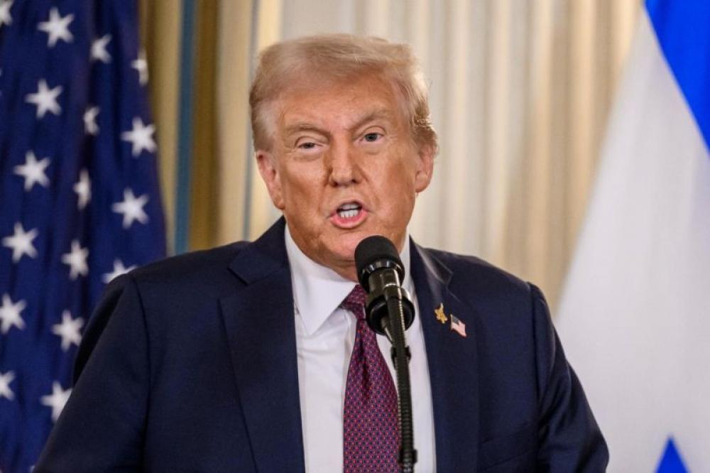 Trump threatens to impose additional 100 percent tariffs on China